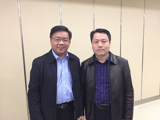 駿伯人力資源集團總裁尹慶陽與餘司長合影